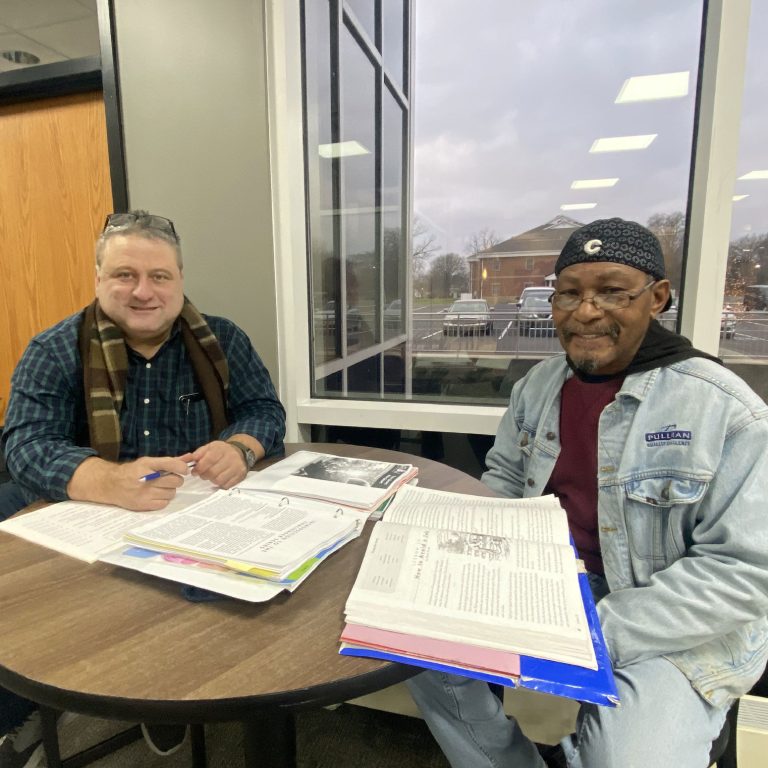 Volunteer Paul with Student Oscar